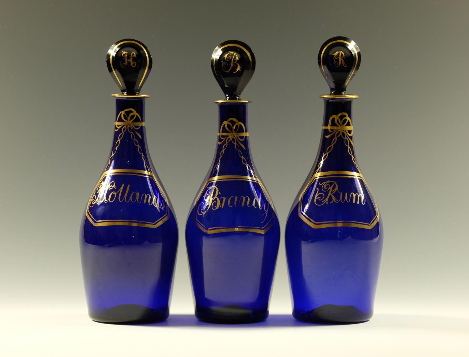 Set of three blue spirit decanters C1790