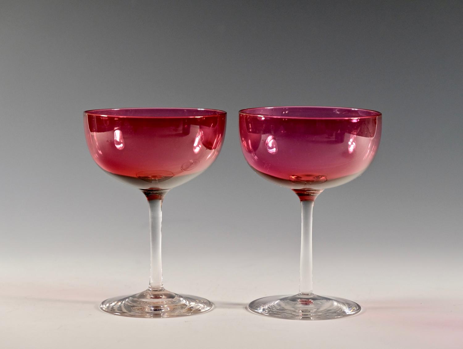 Pair of cranberry champagne glasses English C1880