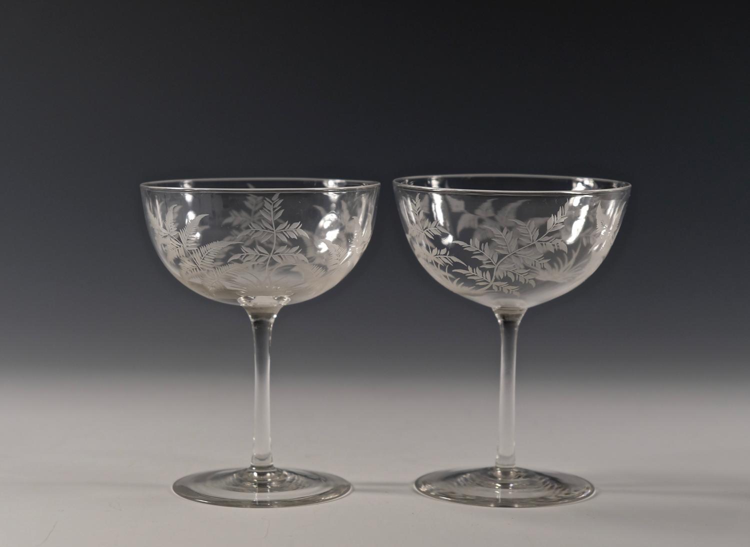 Pair of engraved champagne glasses C1880