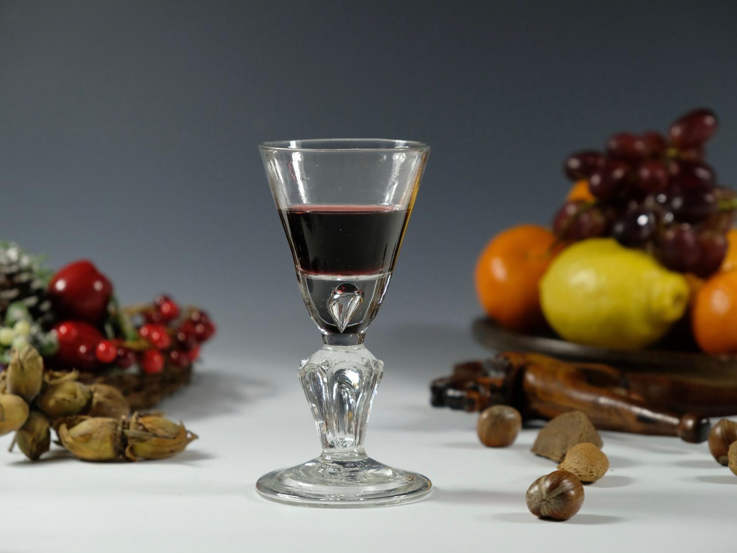 Pedestal stem baluster wine glass English C1720