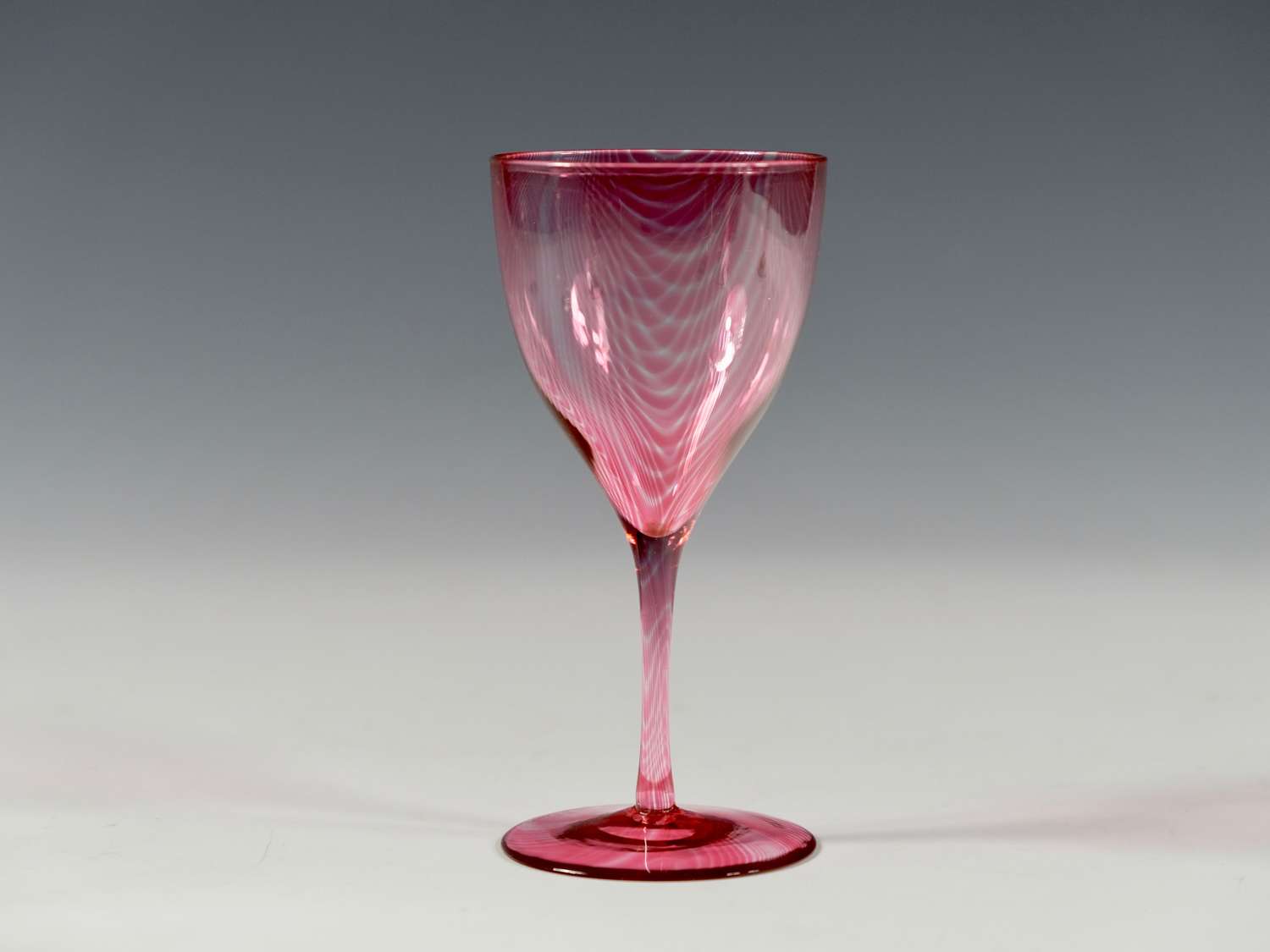 Red wine glass with melted in threads C1880