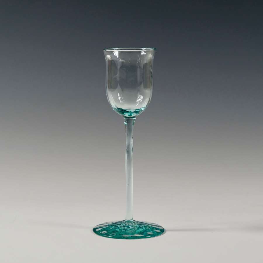 Liqueur glass in pale blue with twisted stem and optical ribbing C1900