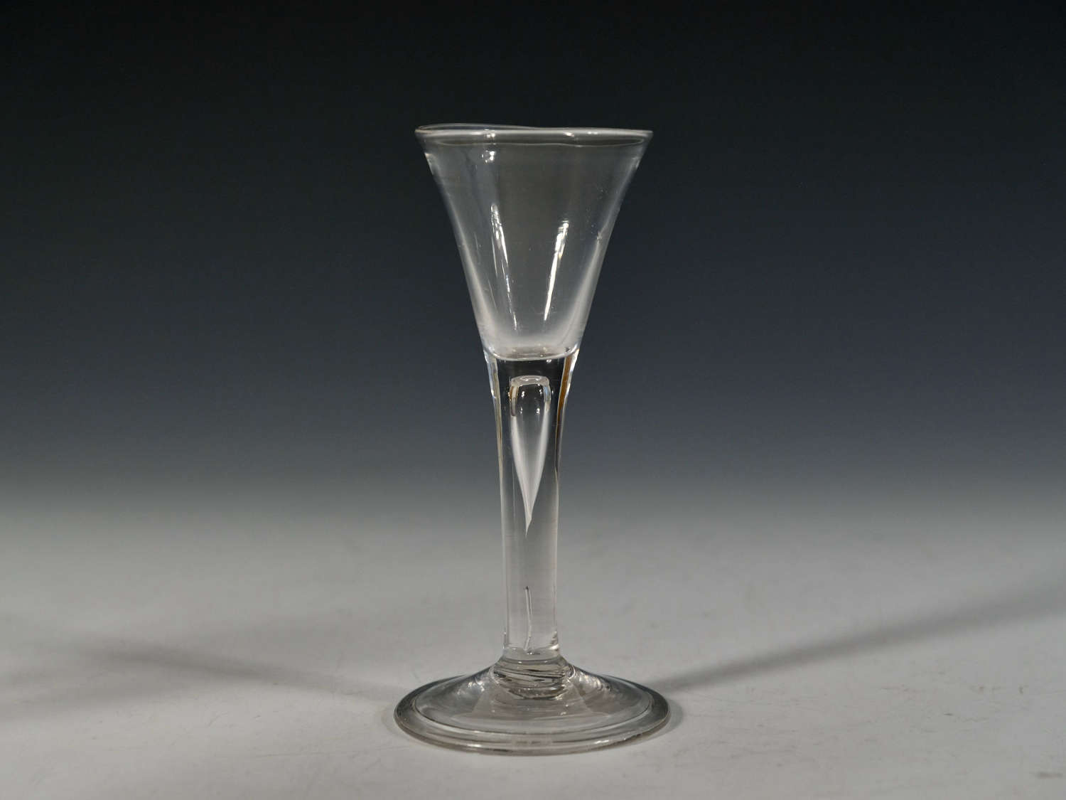 Plain stem drawn trumpet wine glass c1750
