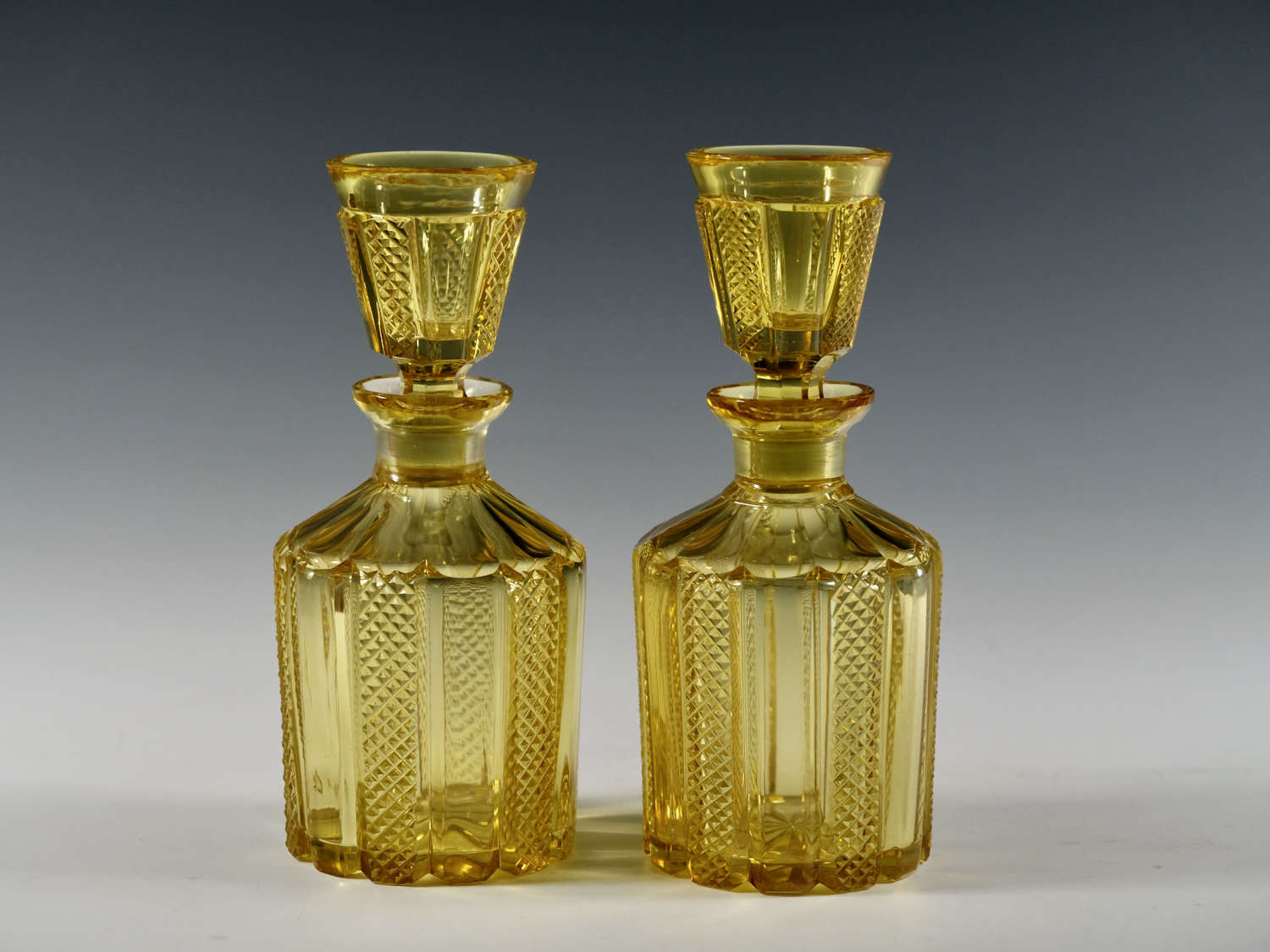 Antique glass - pair of decanters with tasting stoppers c1830