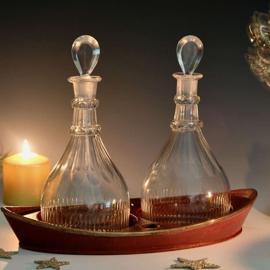 Pair of Decanters in a jolly boat coaster c1790/1800