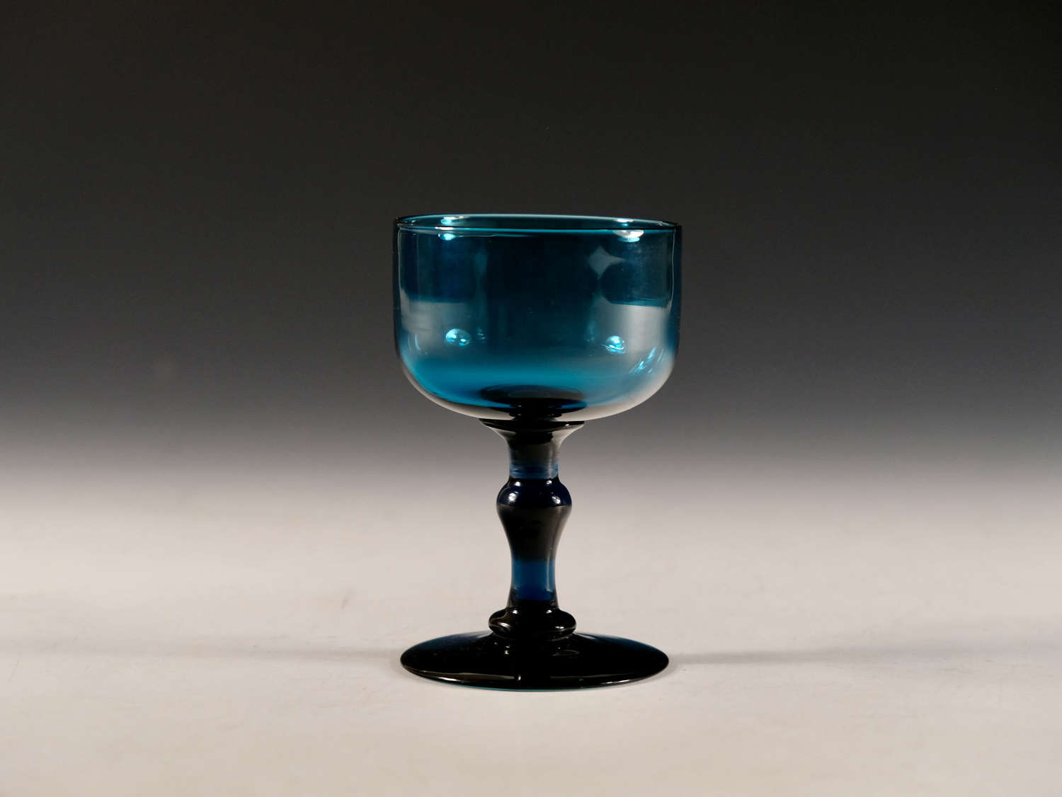 Antique glass teal wine glass English c1820