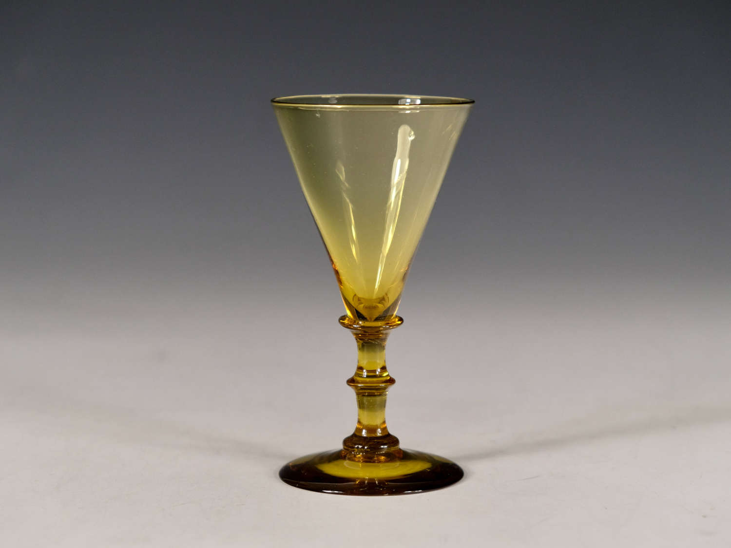 Antique glass amber wine glass English c1850
