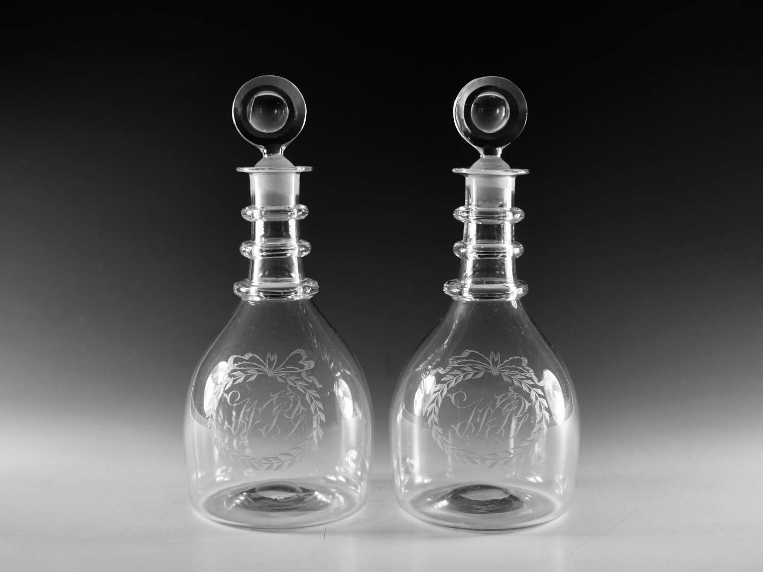 Antique glass - pair of plain three ring decanters English c1820