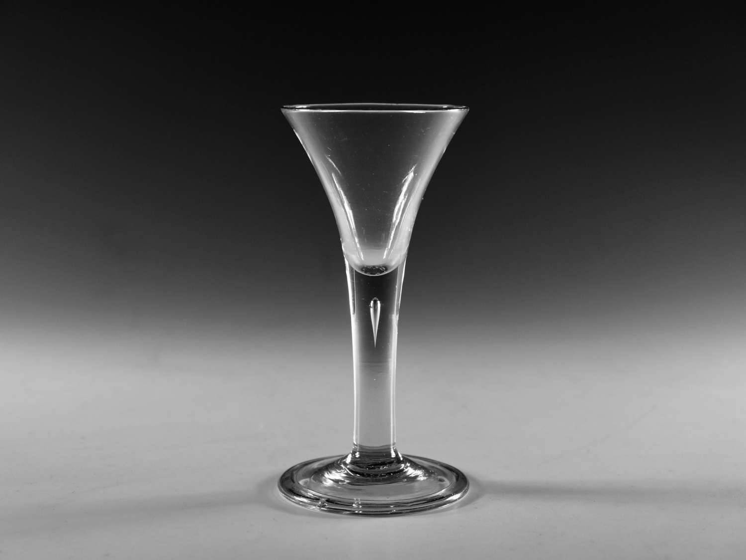 Antique glass - plain stem drawn trumpet wine glass c1760