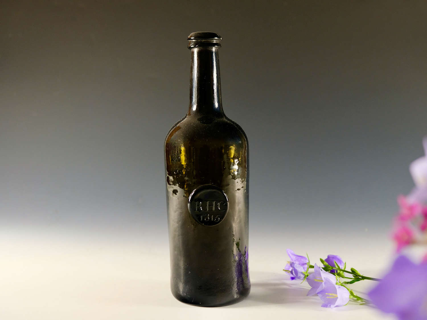 Antique glass - sealed wine bottle RHC 1815