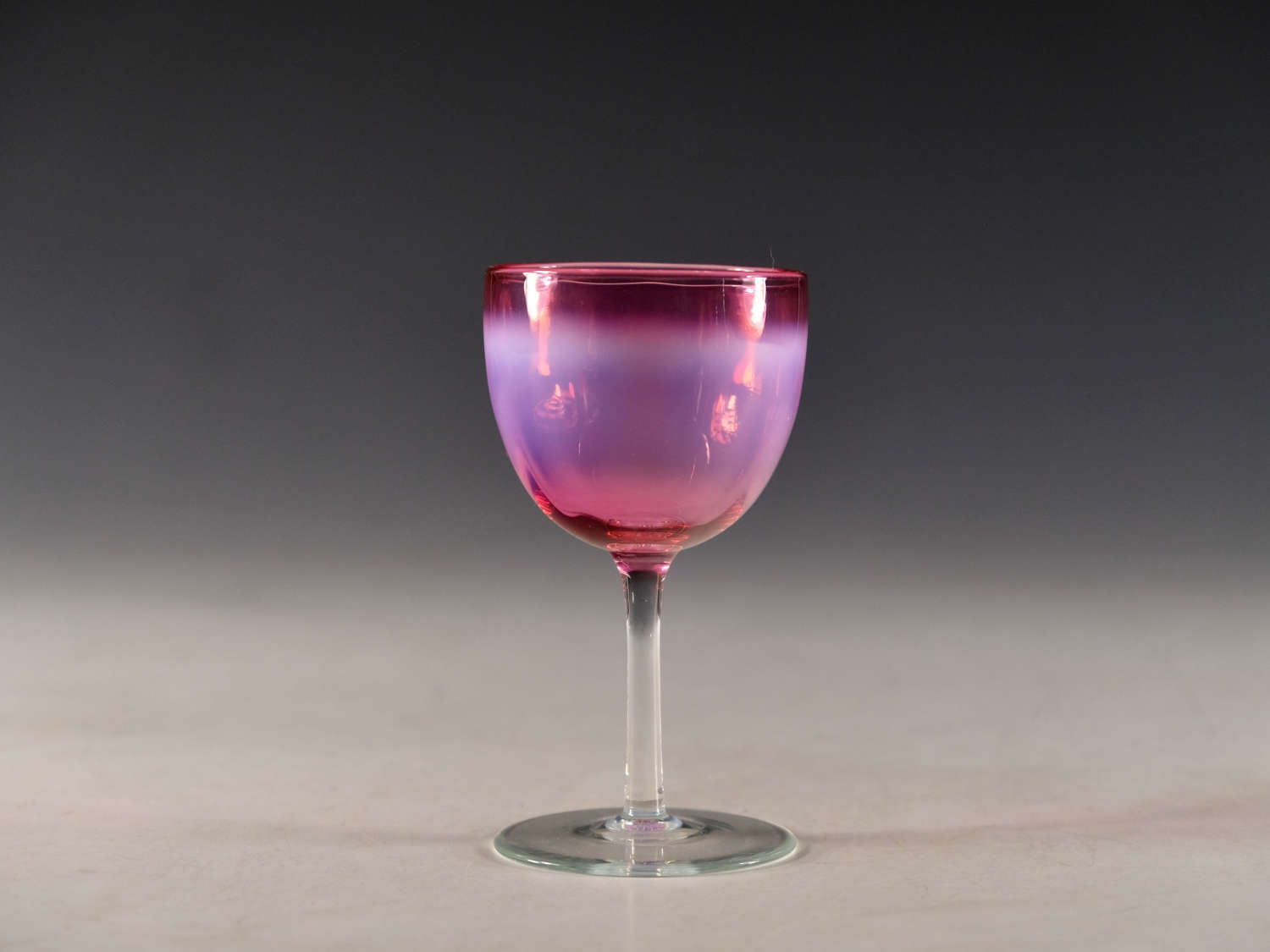 Antique glass - red opal wine glass English 1890