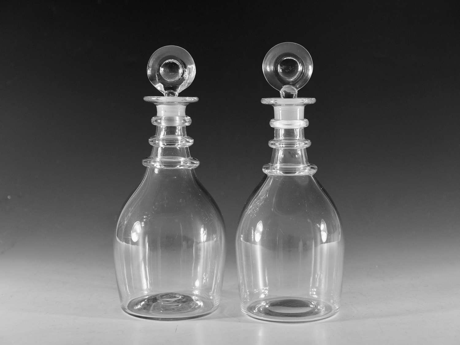Antique glass - near pair of decanters English c1820