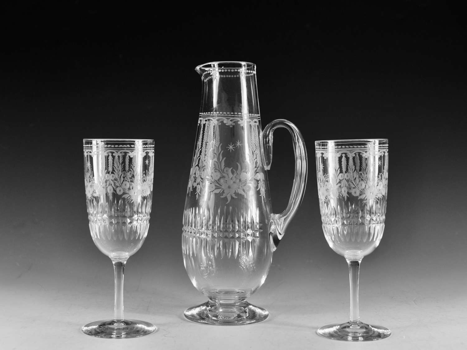 Antique glass engraved jug and two goblets English c1880