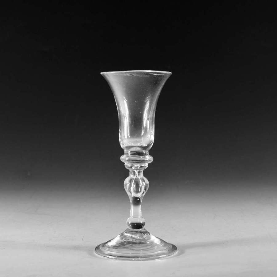 Antique glass light baluster wine glass English c1830