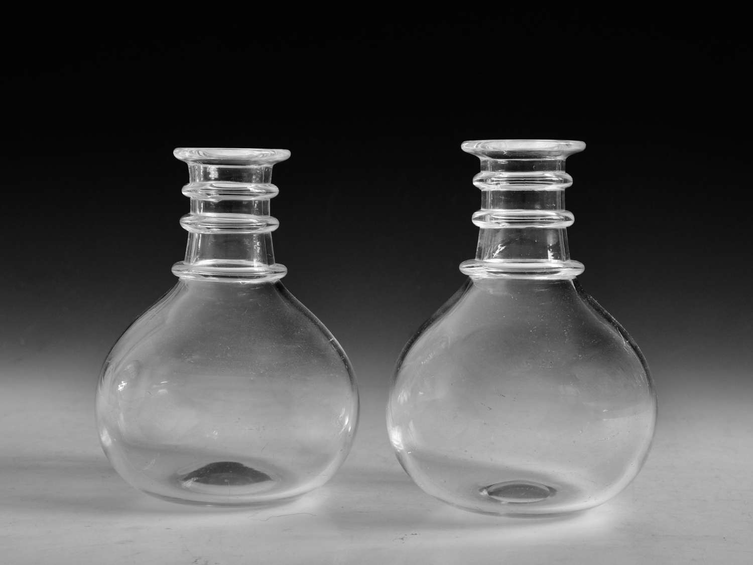 Antique glass carafes pair English c1820