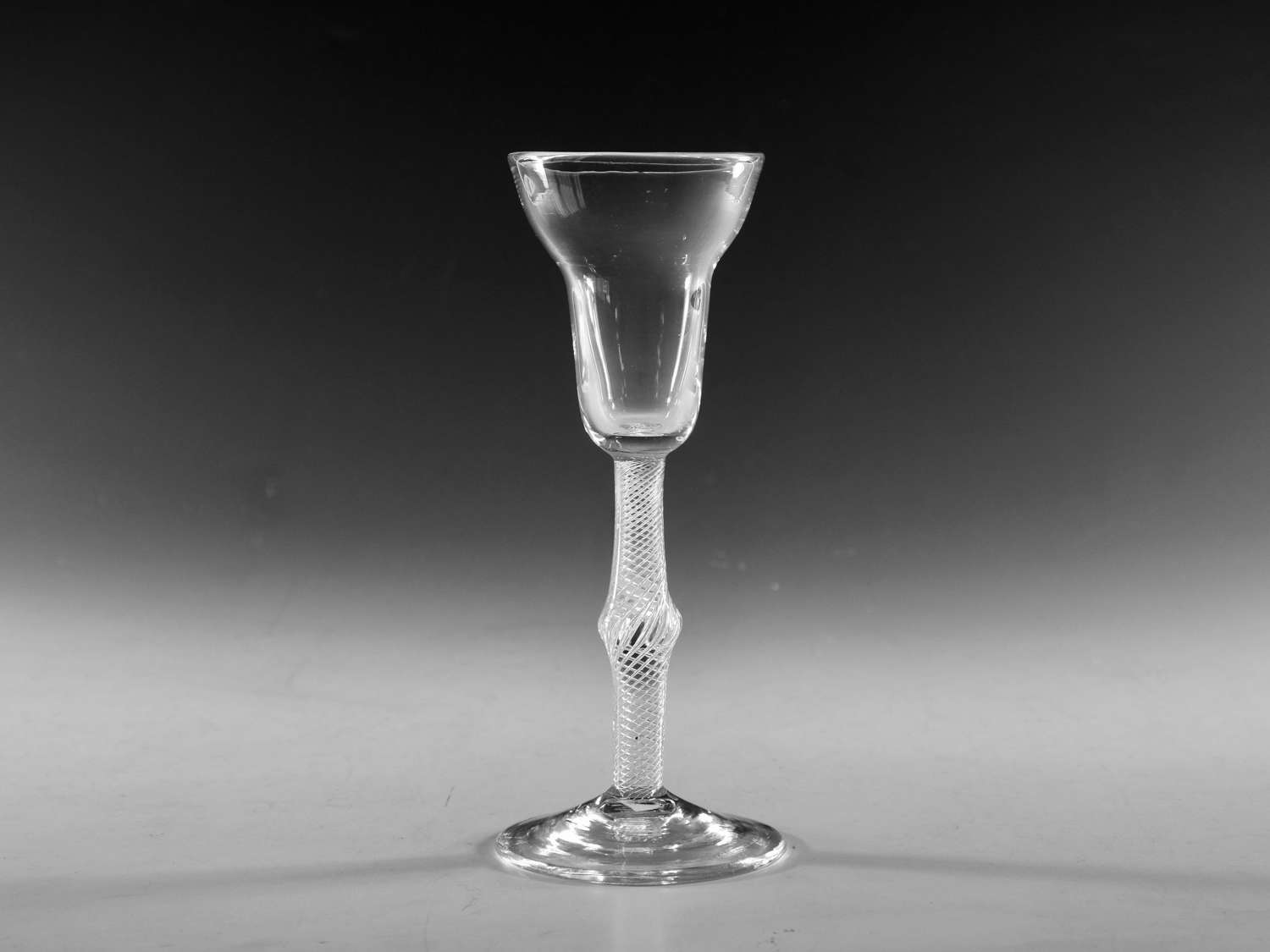 Antique wine glass air twist English 1755