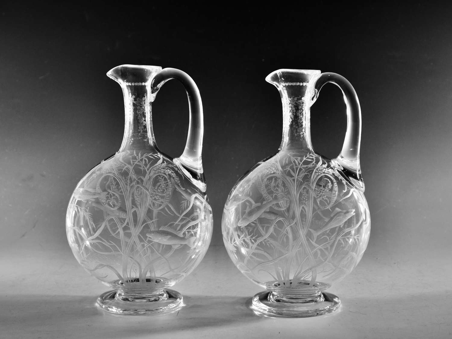 Antique glass wine ewers pair English c1880